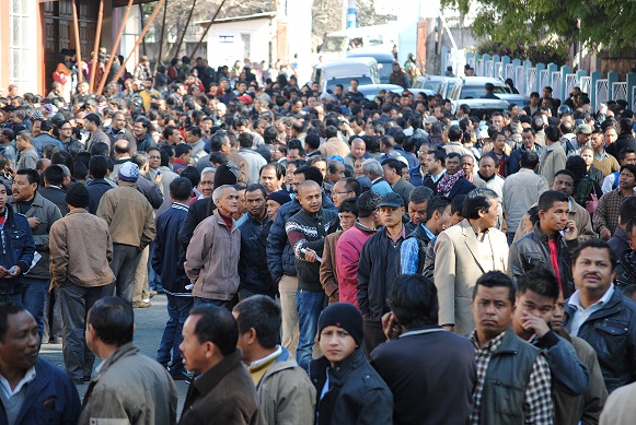 Poll bound officials crowding the U Soso Tham auditorium to register themselves for training. Pix by WT Lyttan 