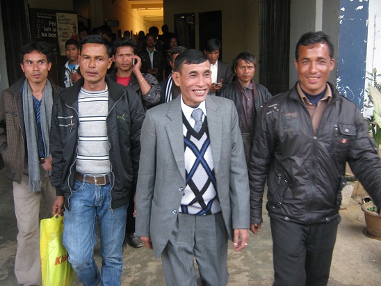 Former HNLC chairman Julius Dorphang flanked by his supporters going to the Nongpoh Returning Officer to file his nomination papers on Tuesday. TM pix