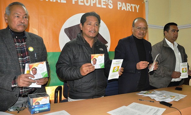 NPP leader Conrad Sangma and state party president WR Kharlukhi releasing the manifesto on Monday. TM pix