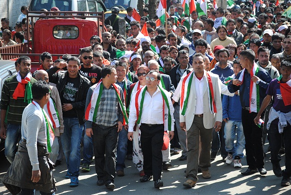 UDP working president Paul Lyngdoh, flanked by supporters, walking towards the DEO to file nomination papers. Pix by WT Lyttan.