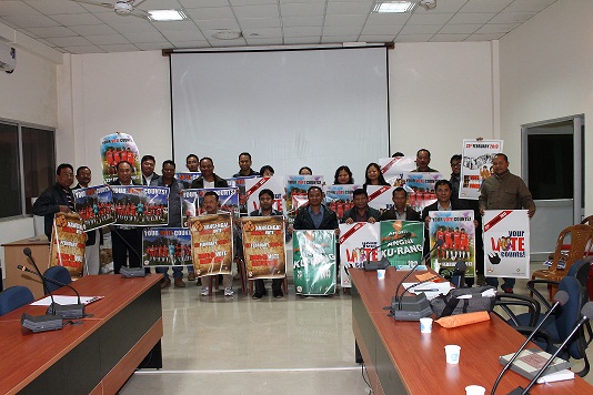 West Garo hills poll officials with election awareness posters.