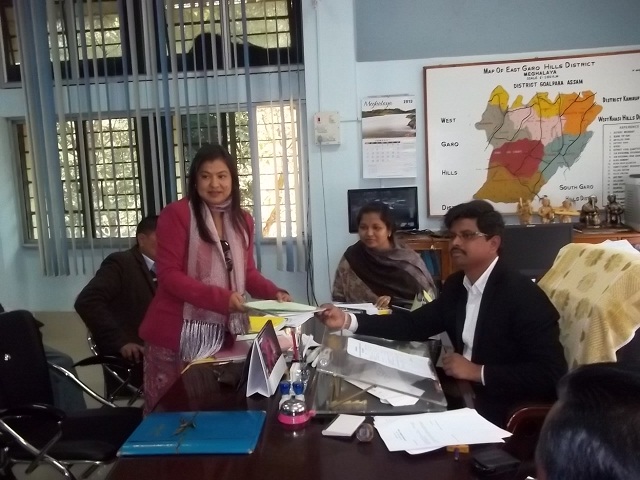 Former deputy chief minister Deborah Marak filing her nomination papers with the East Garo hills District Election Officer Vijay Kumar Mantri.