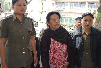 CSWO president and RTI activist Agnes Kharshiing being taken to the district court on Tuesday. Pix by WT Lyttan