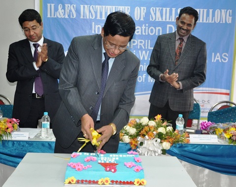 Meghalaya chief secretary WMS Pariat cutting the cake mark the inauguration of the   IL&FS Institute of Skills  on Tuesday.
