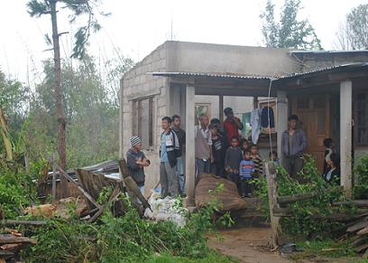 People taking shelter at the roof less houses that was up rooted on Thursday night Cyclone at Lapalang at the outskirt of Shillong.