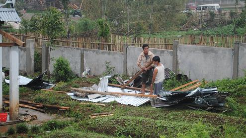 People trying to fix their houses that was up rooted on Thursday night Cyclone at Lapalang at the outskirt of Shillong.