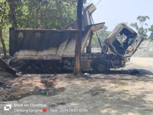 Two dumper trucks set ablaze by miscreants in Tura, WGH